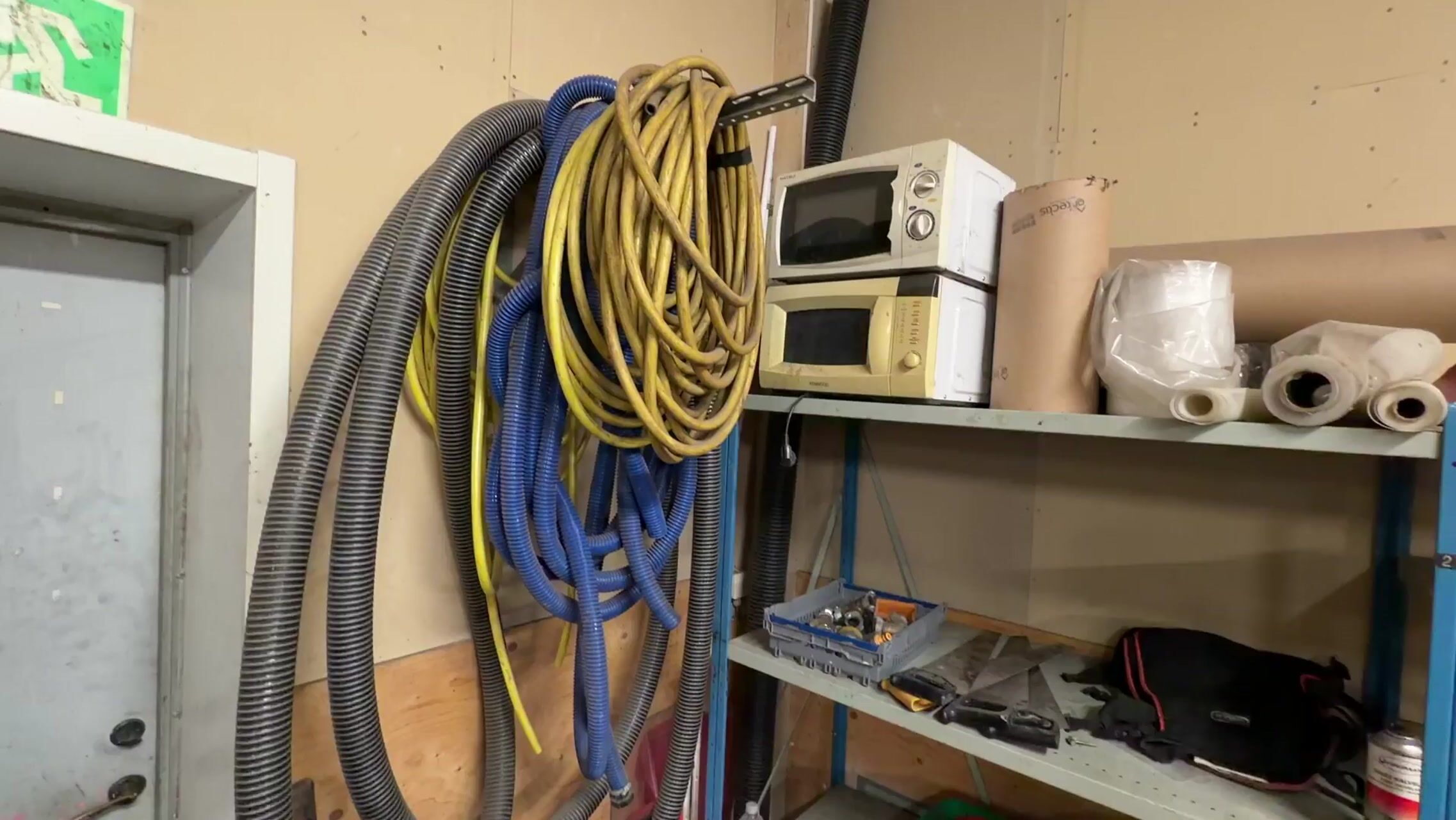 Metal shelving unit with contents